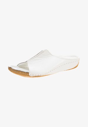 Hvide læder slidesandaler med åben tå, tøjlesyninger og en naturlig korksål. Glat tekstur med et minimalistisk design.