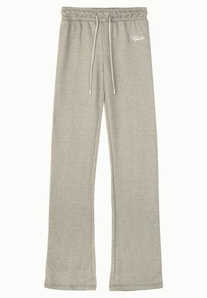 Šedé žebrované tepláky s elastickým pasem, stahovací šňůrkou a bílým logem. Tkanina má měkký, texturovaný vzhled.