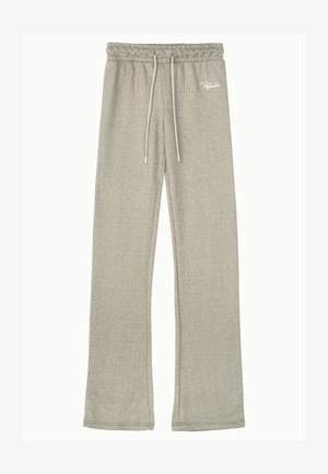 Šedé žebrované tepláky s elastickým pasem, stahovací šňůrkou a bílým logem. Tkanina má měkký, texturovaný vzhled.