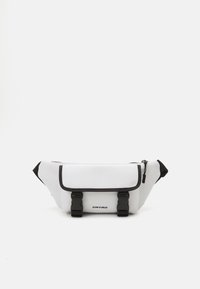 White waterproof fanny pack with black accents, adjustable straps, front flap, and logo detail; curved shape with side zippers for access.