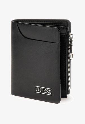 Schwarze Guess Geldbörse aus strukturiertem Leder, mit Reißverschluss, Kartenfächern und einem silbernen Logo auf der Vorderseite. Kompakte und rechteckige Form.