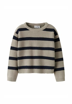 Pull en maille rayé beige avec des rayures navy. Il présente une texture côtelée, un col rond et une longueur raccourcie. Manches longues et coupe décontractée.