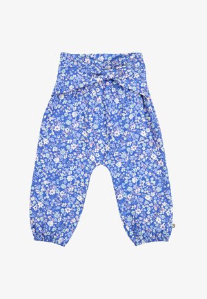 Blå løstsiddende babybukser med pastelfarvet blomsterprint, elastiske ankler og en bred linning, der bindes i en sløjfe foran.