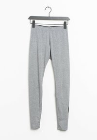 Gray leggings made from a stretchy fabric, featuring a fitted design with an elastic waistband and a subtle black accent detail on the side.