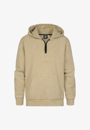 Beige vetoketjullinen huppari, jossa kaulus, etutasku ja resorit hihansuissa, yhdistetty tummiin housuihin ja valkoisiin lenkkareihin. Sileä, puuvillainen pinta.