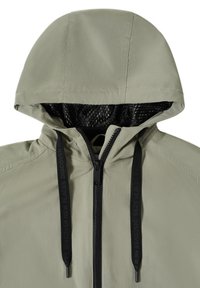 Veste à capuche vert clair avec doublure en mesh noir, fermeture éclair centrale noire et cordons noirs ornés de texte en relief.