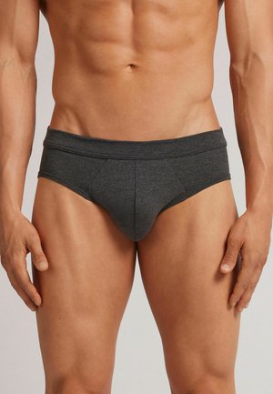 Grau Baumwollslips mit enger Passform und gefaltetem Bund, die eine glatte Textur und ein minimalistisches Design aufweisen.