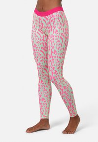 Vaaleanpunaiset ja vihreät kuviolliset legginsit, joissa on sileä ja joustava kangas; korkea vyötärö, jossa on rohkea epäsäännöllinen kamouflagekuvio.