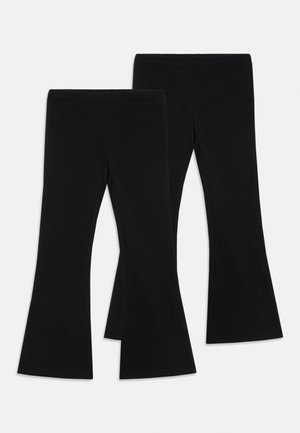Sorte flared leggings i et strækbart stof, med høj talje og glat tekstur. De har en bred benåbning i bunden.