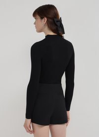 Calliope CON SPACCO  - Shorts - nero