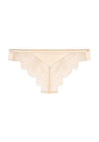 Beige kanten stringondergoed met bloemenborduursel en geschulpte randen, satijnen tailleband en klein merkje aan de zijkant.