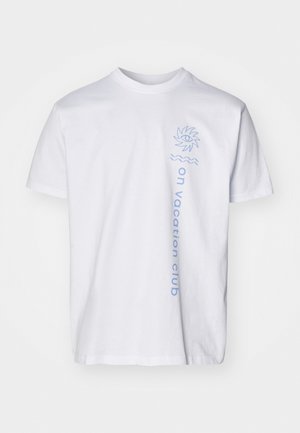 White cotton t-shirt featuring light blue graphics of a sun and the text "on vacation club" vertically along the side. Short sleeves.