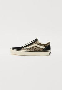Black and brown leopard print sneaker with a suede upper, white laces, and cream rubber sole. Features contrasting black toe cap and heel.