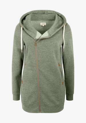 Un long hoodie zippé gris fabriqué en tissu doux et texturé, avec une grande capuche, des cordons de serrage crème et des accents triangulaires beiges sur les poches.