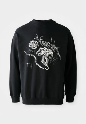 Sweatshirt noir avec un col rond mettant en avant des designs graphiques blancs représentant un œil, une main et un diamant à l'avant. Fabriqué en tissu doux.