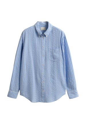 Chemise à manches longues bleu clair à boutons, avec des rayures verticales blanches et jaunes et une poche poitrine, présentée sur un fond blanc.