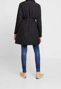 Calvin Klein Jeans Pitkä takki - black