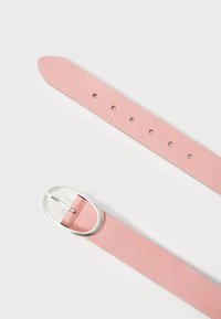 Pink leather belt with smooth texture and oval silver buckle. Features multiple holes for adjustment along the strap.