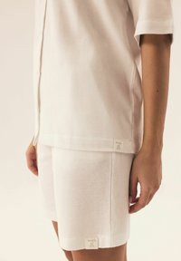 Henderson NILSA mleczny