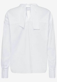 Blouse blanche à manches longues avec col montant et nœud lâche attaché dans le dos, équipée de poignets boutonnés et d'une coupe décontractée.