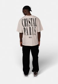 CRYSTAL PARIS FACE - Triko s potiskem - coconut