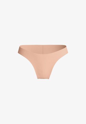 Culotte string nude avec une texture lisse et extensible. Dispose d'une large ceinture et d'un design minimaliste, offrant une couverture complète à l'arrière.