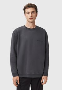 Mørkegrå sweatshirt i blødt bomuld med rund hals, lange ærmer og lille 'ALLSAINTS' logo detaljeret foran. Enkelt design.
