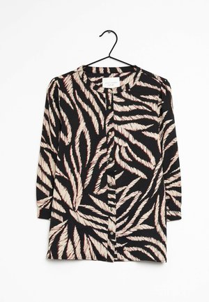 Camicia nera abbottonata con motivo foglia bianco e rosso, con maniche lunghe e scollo rotondo, realizzata in un tessuto leggero.