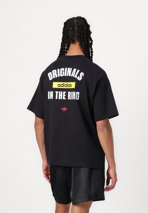 RING TEE - Print T-shirt - black