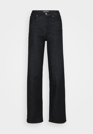 Viddebukser i svart denim med høy midje, med front knappelukking, fem lommer og en glatt tekstur.