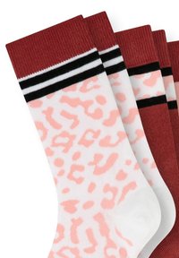 Four pairs of socks with a white base, featuring pink leopard print, and ribbed maroon cuffs with black and white stripes at the top.