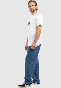 Homeboy X-TRA BAGGY  - Traperice ravnih nogavica - washed blue denim