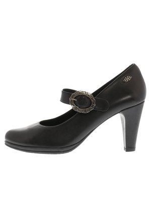 Schwarzer Lederhochschuh mit runder Spitze und ankle strap, der eine dekorative metallische Schnalle hat. Hochhackiges Design, glatte Textur.