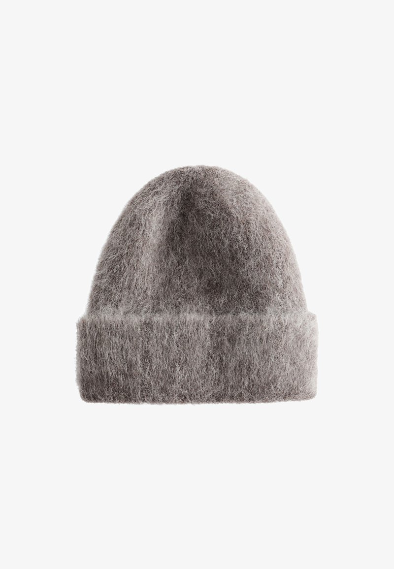 Gray knitted beanie made of soft, fluffy material. Features a turned-up cuff and a rounded top for a snug fit.
