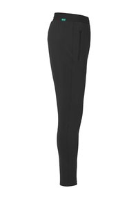 Pantalons de sport noirs à coupe slim, avec une taille élastique et des poches zippées sur les côtés. Le matériau semble lisse et extensible, adapté pour une tenue active.
