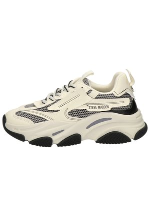 Chunky white and gray mesh sneaker with black accents, thick sole, lace-up closure, and "Steve Madden" logo on side panel.