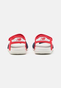 New Balance IOSPS UNISEX - Sandalen - true red