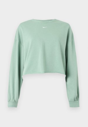 Ανοιχτό πράσινο cropped φούτερ με μακριά μανίκια, ελαστικά τελειώματα και μικρό λευκό λογότυπο Nike στο κέντρο κάτω από το λαιμό.