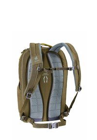 Zaino khaki con spallacci imbottiti con rivestimento in rete, cintura toracica regolabile, tasche laterali e un tessuto resistente con una superficie liscia.