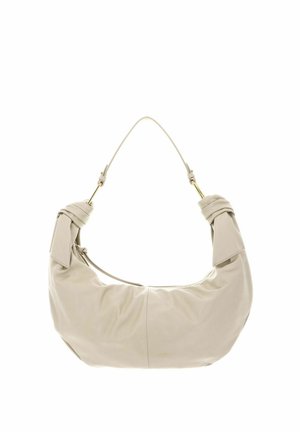 Sac à bandoulière en cuir beige avec extrémités de sangle nouées et forme incurvée en croissant.