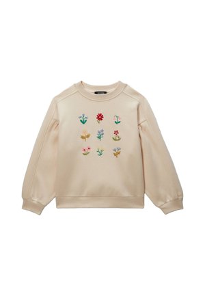 Sweat-shirt beige à manches longues avec neuf fleurs brodées colorées disposées en grille sur le devant.
