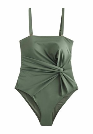 Costume da bagno intero verde oliva con spalline sottili, caratterizzato da un design frontale drappeggiato e un dettaglio annodato, realizzato in tessuto liscio ed elastico.
