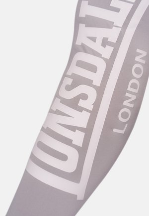 Pilkas kojų rankovė su balta tekstine dizaino dalimi, kurioje užrašyta "LONSDALE" ir "LONDON". Pagaminta iš sklandžios, elastingos medžiagos.