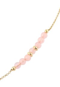 Bracelet chaîne en or avec des perles rose rosé alternant avec des intercalaires dorés, présentant une texture lisse et une forme ronde.