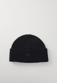 Beanie lavorato a maglia blu navy con una texture a coste, dotato di un risvolto e di un piccolo logo ricamato sul davanti.