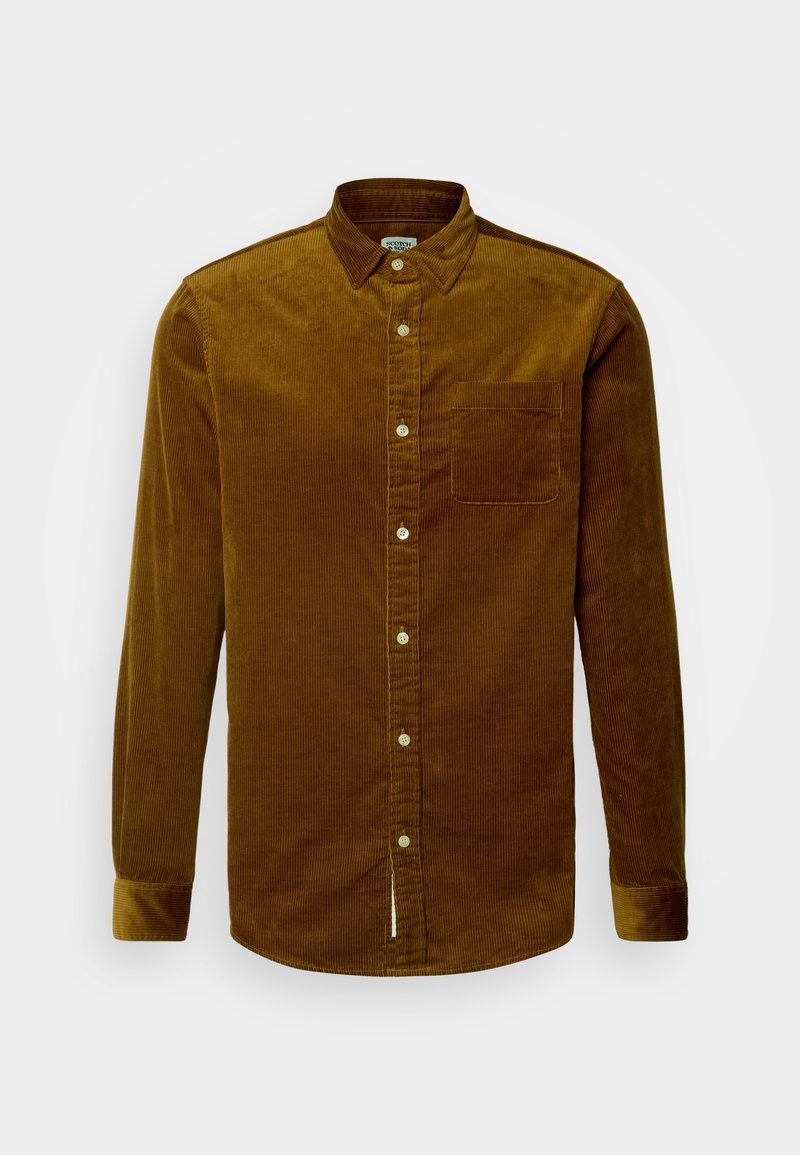 Braunes Cordhemd mit Button-Down-Kragen, langen Ärmeln, einer einzelnen Brusttasche und vorderer Knopfleiste. Strukturierter gerippter Stoff.