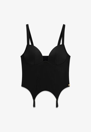 Bustier noir avec bonnets à armatures, bretelles réglables et attaches porte-jarretelles en bas à l'avant.