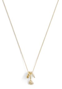 Gold necklace with a delicate chain, featuring three pendants: one circular, one bar with stones, and a heart-shaped charm with embellishments.