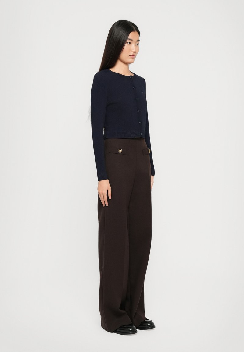 River Island - Robe pull cintrée à la taille - Noir River Island - Robe pull cintrée à la taille - Noir