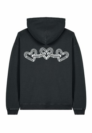 Haut à capuche noir avec un grand contour blanc de cœurs entrelacés au dos. Comprend une capuche avec cordon de serrage et des poignets et un ourlet côtelés.